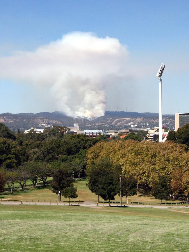 Smoke rises in the Adelaide Hills, as seen from Montefiore Hill in North Adelaide.