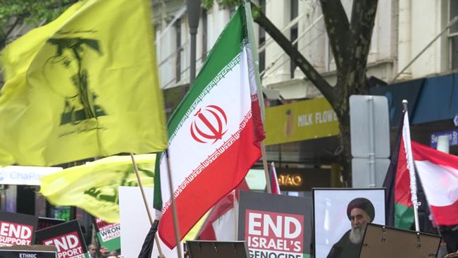 A Melbourne man has been charged for displaying a Hezbollah flag during a protest outside of the State Library. Picture: NewsWire / Valeriu Campan