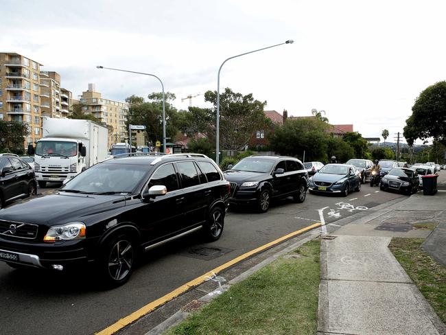 Southbound Spit Rd traffic banked up during morn peak hour near the Warringah Rd rat run in Mosman. Picture: Annika Enderborg