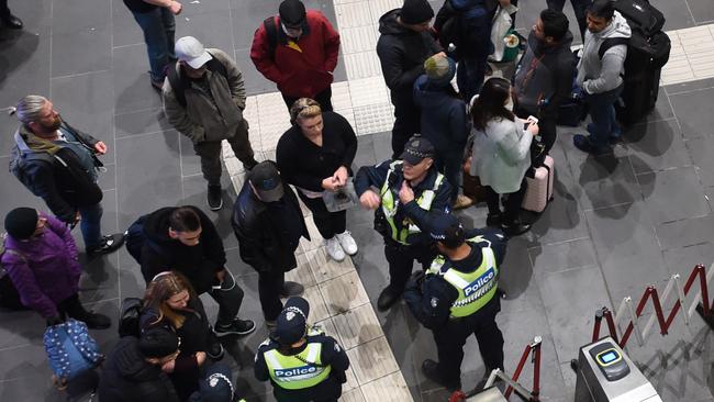 Police respond to reports of a gun at Southern Cross Station. Picture: Tony Gough