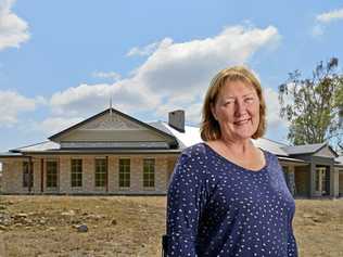 ON TRACK: Peggy Hockey is just a couple of weeks away from moving into her new home in Mount Alford, which ground to a halt after the collapse of G.J Gardner's North Ipswich franchise in January. She is still out of pocket about $100,000. Picture: Cordell Richardson