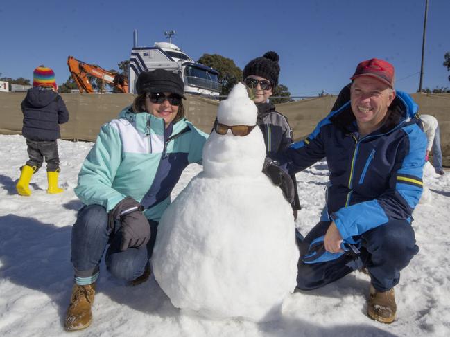 Jayne, Mike and Josh Lawlor from the Sunshine Coast at Snowflakes in Stanthorpe on Saturday, July 1.