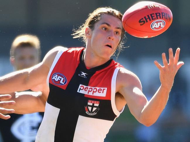 MELBOURNE, AUSTRALIA - MARCH 04: Jack Steele of the Saints is tackled by Ed Curnow of the Blues during the 2017 JLT Community Series AFL match between the Carlton Blues and the St Kilda Saints at Ikon Park on March 4, 2017 in Melbourne, Australia. (Photo by Quinn Rooney/Getty Images)