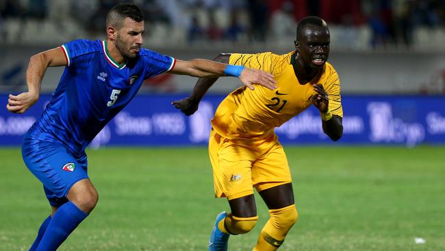 Awer Mabil races Kuwait’s Fahad Alhajeri to the ball during the FIFA World Cup Qatar 2022 qualifier last month. Picture: Tom Dulat/Getty Images