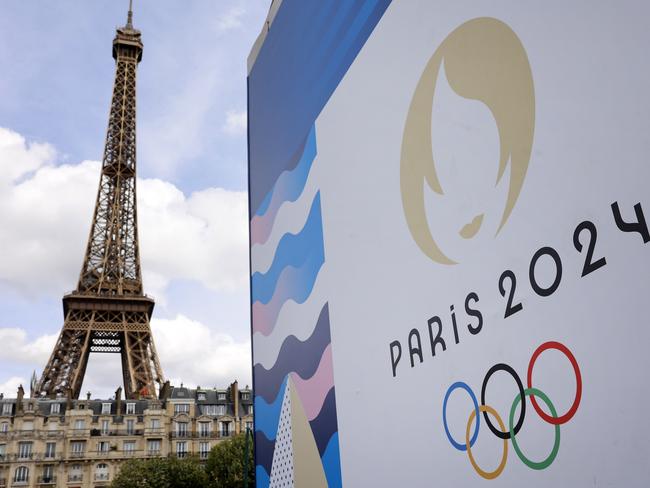 PARIS, FRANCE - JUNE 17: The Paris 2024 logo is displayed near the Eiffel Tower before the start of the Paris 2024 Olympic and Paralympic Games on June 17, 2024 in Paris, France. The city is gearing up to host the XXXIII Olympic Summer Games, from 26 July to 11 August. (Photo by Chesnot/Getty Images)Escape 7 July 2024Doc updatesPhoto - Getty Images