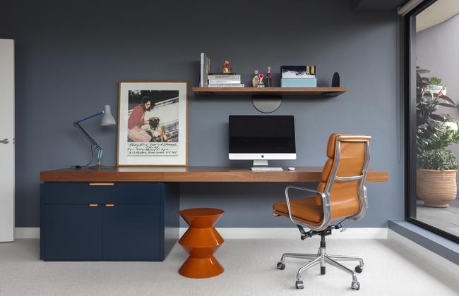 This small workplace in an apartment by Arent &amp; Pyke has everything its owner needs, including storage. Picture: Tom Ferguson