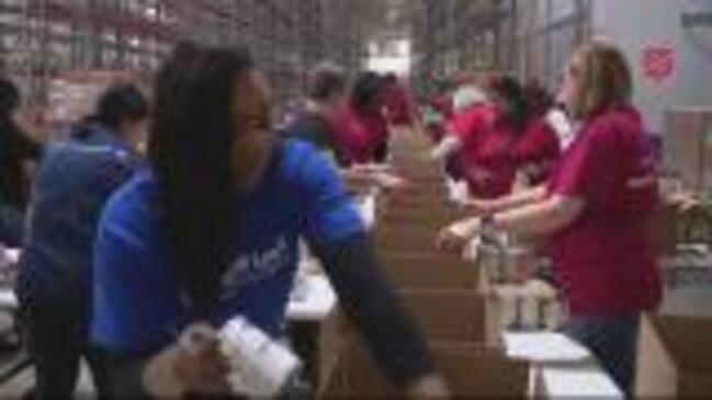 bank-of-america-workers-pack-food-boxes-for-those-in-need-the-courier