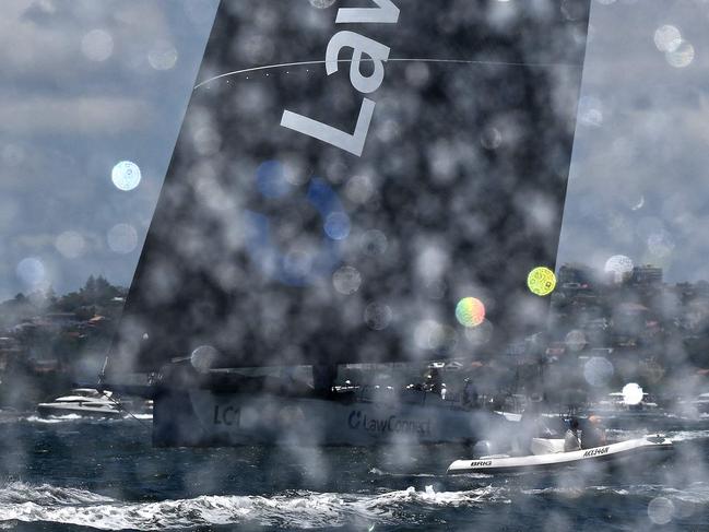 LawConnect competes in the 2022 SOLAS Big Boat Challenge at the harbour in Sydney on December 6, 2022. (Photo by SAEED KHAN / AFP) / -- IMAGE RESTRICTED TO EDITORIAL USE - STRICTLY NO COMMERCIAL USE --