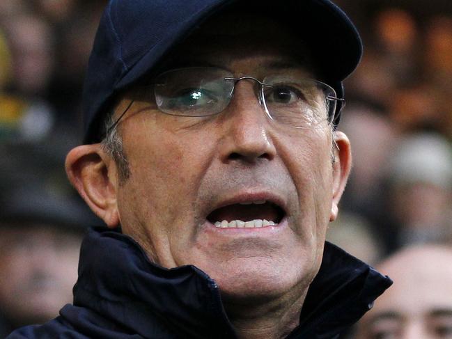 (Files) In this file picture taken on November 30, 2013, Crystal Palace's Welsh manager Tony Pulis awaits the start of his first match as manager ahead of the English Premier League football match against Norwich City at Carrow Road in Norwich. Tony Pulis's future as Crystal Palace manager was plunged into uncertainty on Thursday, just two days out from the start of the new Premier League season, after reports of crisis talks with co-chairman Steve Parish. Pulis has grown frustrated by Palace's failure to push through deals for various players he targeted to strengthen the squad, according to a BBC report. AFP PHOTO/IAN KINGTON RESTRICTED TO EDITORIAL USE. NO USE WITH UNAUTHORIZED AUDIO, VIDEO, DATA, FIXTURE LISTS, CLUB/LEAGUE LOGOS OR “LIVE” SERVICES. ONLINE IN-MATCH USE LIMITED TO 45 IMAGES, NO VIDEO EMULATION. NO USE IN BETTING, GAMES OR SINGLE CLUB/LEAGUE/PLAYER PUBLICATIONS.