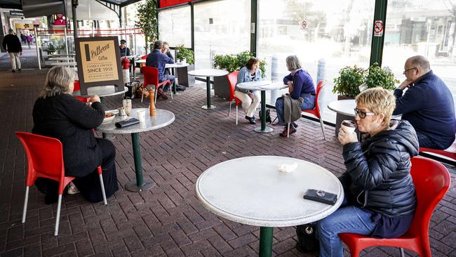 Some more cafe-goers enjoying their morning coffee in Norwood on Monday. Picture: Mike Burton