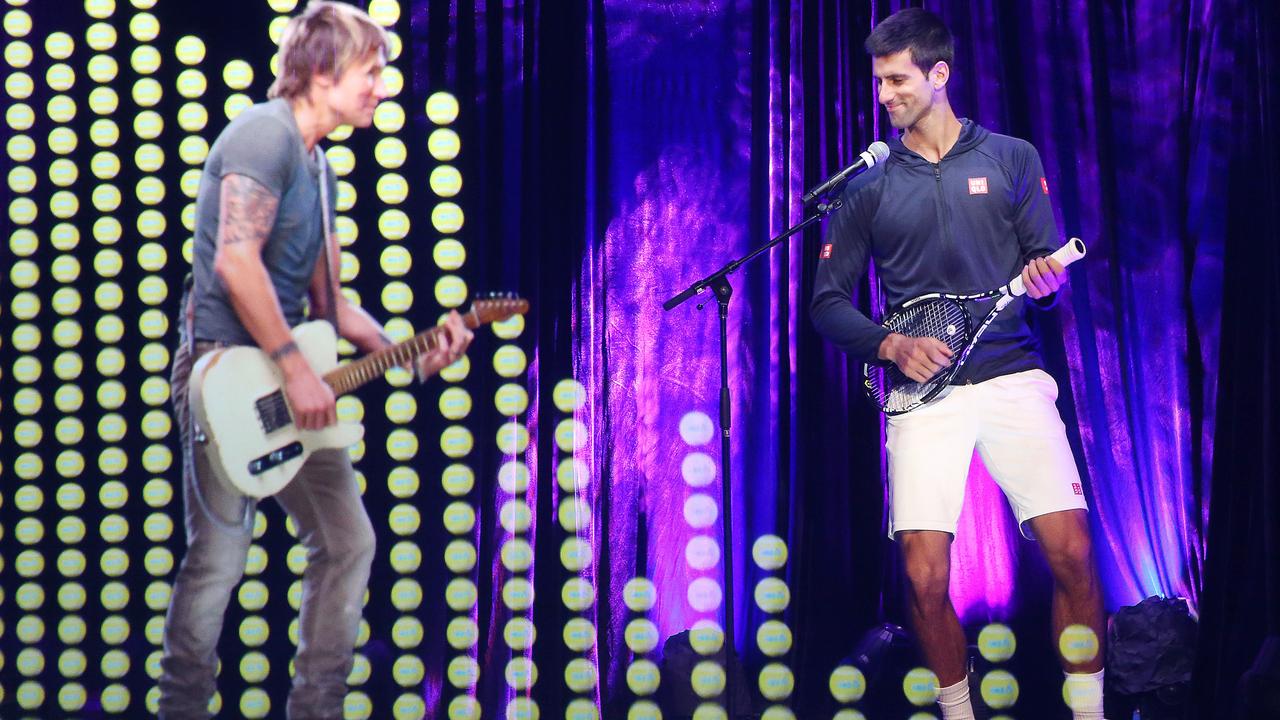 Tennis player Novak Djokovic had some fun with a hologram of music star Keith Urban at the Australian Open in Melbourne, Victoria in 2015. Picture: Julie Kiriacoudis