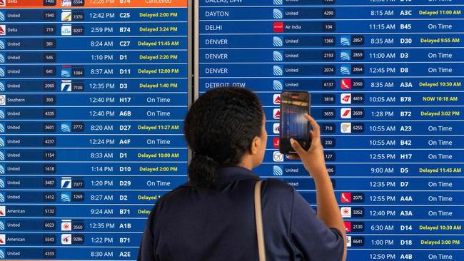 US airlines are now required to issue passengers automatic refunds for tickets and other flight-related expenses should their flight get cancelled or significantly delayed. Picture: Roberto Schmidt/Getty Images/AFP