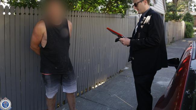 Lindsay Moody (left) arrested at a building site at Birchgrove in September 2020. Picture: NSW Police