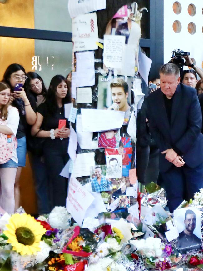 Mr Payne looks at tribute to his son, Liam Payne. Picture: Getty Images