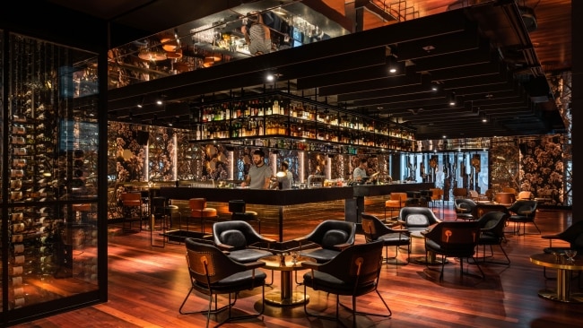 <h2>QT Perth</h2><p>From the touches of local jarrah timber to wallpaper with a black cockatoo motif, QT embodies a modern sense of Oz luxe without ever straying into pastiche or pretension. The Santini Bar is a must for low-key meetings and excellent cocktails. Be sure to check out the ace rooftop bar for sundowners and incredible skyline views.</p><p class="button-common"><a title="https://go.skimresources.com?id=145349X1636243&amp;xs=1&amp;url=https%3A%2F%2Fwww.booking.com%2Fhotel%2Fau%2Fqt-perth.html" href="https://go.skimresources.com?id=145349X1636243&amp;xs=1&amp;url=https%3A%2F%2Fwww.booking.com%2Fhotel%2Fau%2Fqt-perth.html" target="_blank" data-cta="https://go.skimresources.com?id=145349X1636243&amp;xs=1&amp;url=https%3A%2F%2Fwww.booking.com%2Fhotel%2Fau%2Fqt-perth.html" data-editable="true">Book here</a></p>