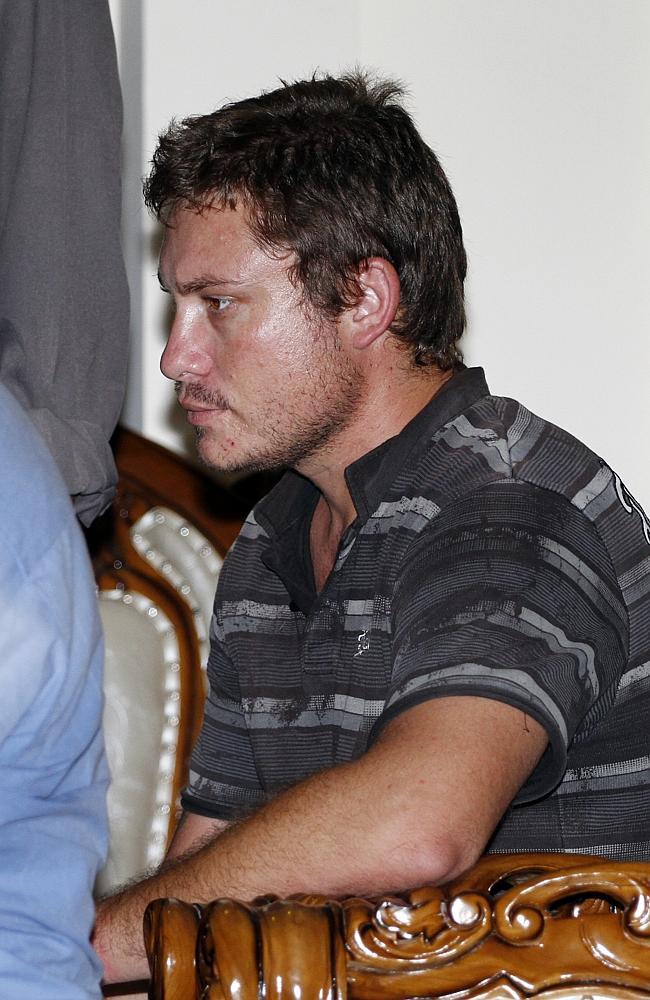 Refused to comment ... Matt Lockley is seen at a holding room in Bali, Indonesia, Friday, after allegedly trying to attempt to break into the pilots’ cockpit.