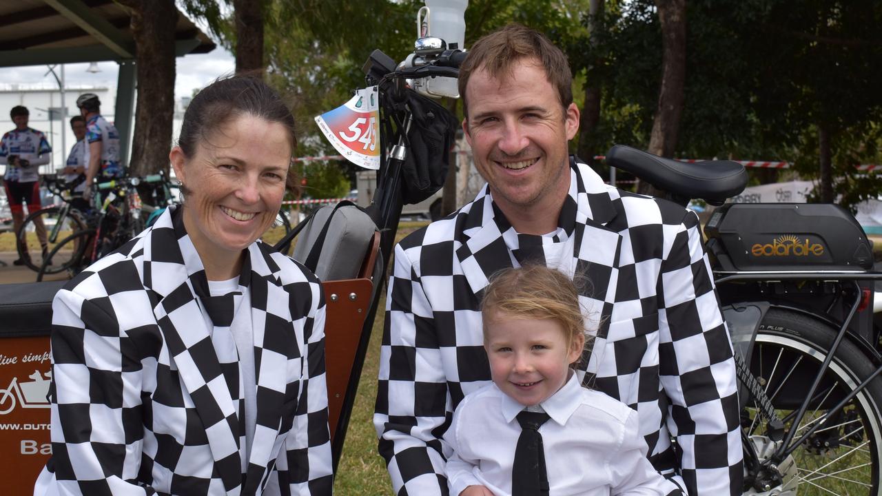 Having an impact in black and white are (from left) Amy Weller, Chuck Weller and Stella Weller, 3, at the River2Reef Ride. Picture: Tara Miko