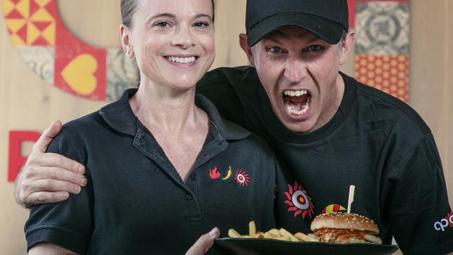 Oporto Franchisees Nicole Skjaerbaek and Geoff Bassett are celebrating the opening of thier store at the Robina Home Hub on Saturday 18 January by giving away 500 FREE burgers from 12pm to celebrate the opening of this new store. Picture: Glenn Campbell