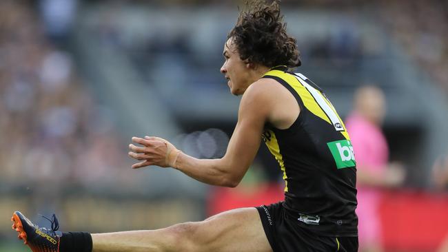 Daniel Rioli boots his first goal in the prelim. Picture: Alex Coppel