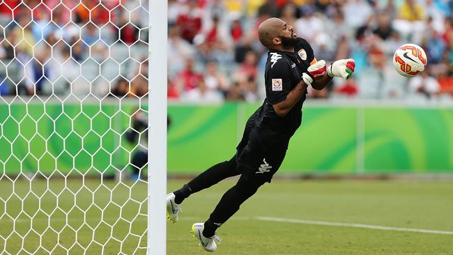 CANBERRA, AUSTRALIA - JANUARY 10: Ali Al Habsi of Oman stops a shot on goal during the 20145 Asian Cup match between Korea Republic and Oman at Canberra Stadium on January 10, 2015 in Canberra, Australia. (Photo by Stefan Postles/Getty Images)