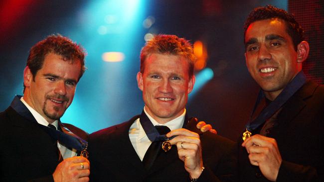 Mark Ricciuto with Nathan Buckley and Adam Goodes after winning the Brownlow Medal.