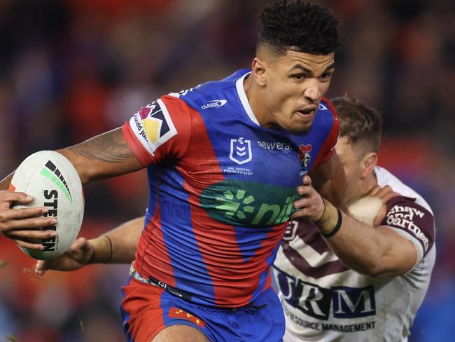 NEWCASTLE, AUSTRALIA - JUNE 05: Kai Pearce-Paul of the Knights breaks a tackle during the round 14 NRL match between Newcastle Knights and Manly Sea Eagles at McDonald Jones Stadium, on June 05, 2025, in Newcastle, Australia. (Photo by Scott Gardiner/Getty Images)