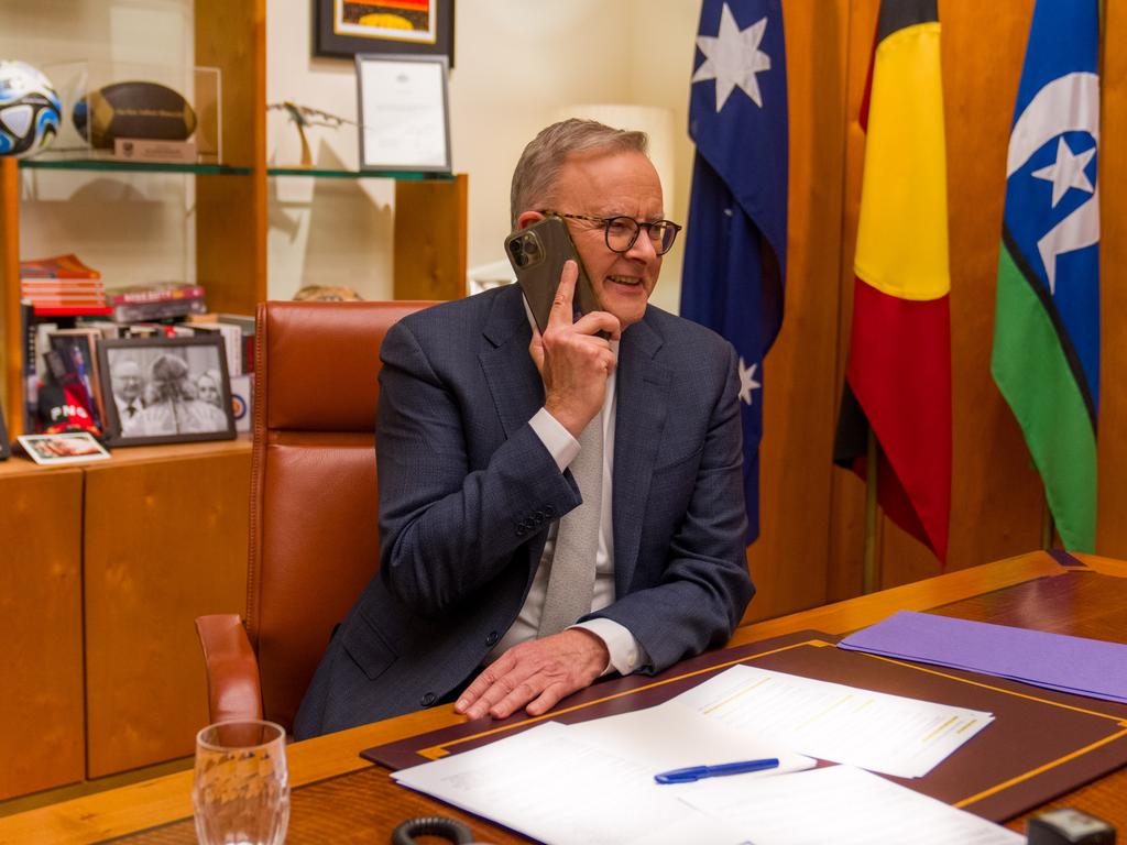 Prime Minister Anthony Albanese, pictured here speaking with Julian Assange to welcome him home in June.