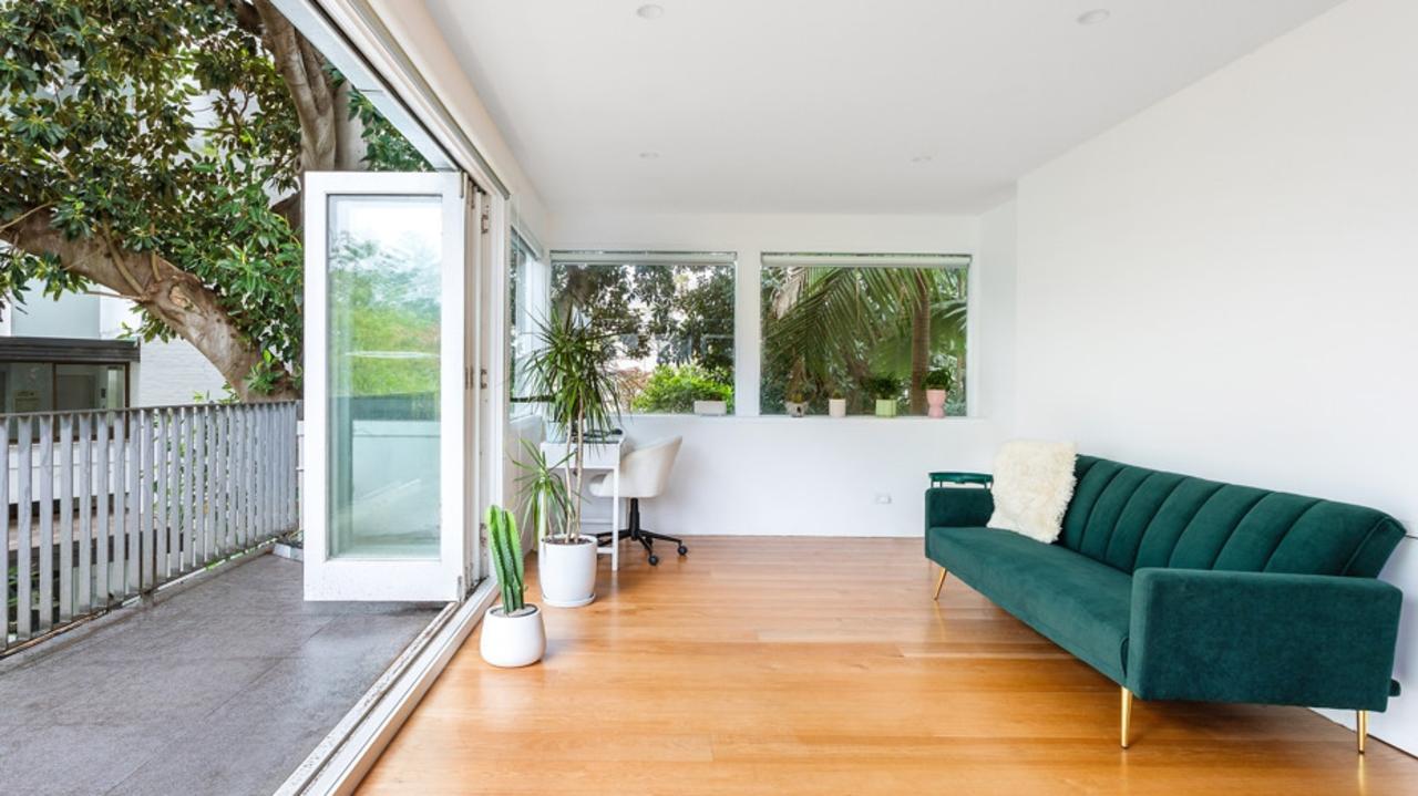 Bifold doors open to a terrace.