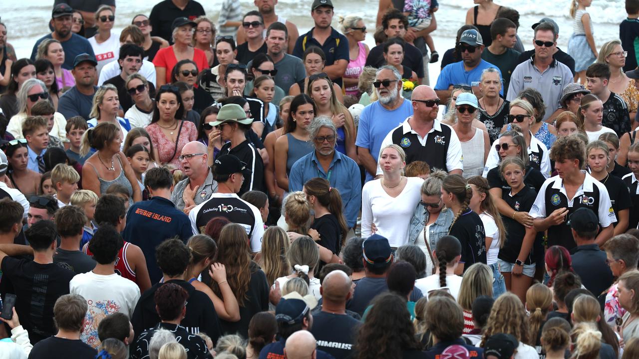 Hundreds of people have gathered at Bribie Island for a vigil to honour 17-year-old shark attack victim Charlize Zmuda. Picture: David Clark