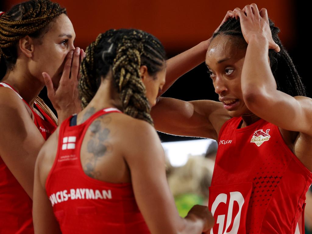 Geva Mentor, Stacey Francis-Bayman and Layla Guscoth of England look dejected following their Commonwealth Games semi-final loss to Australia. Picture: Eddie Keogh/Getty Images