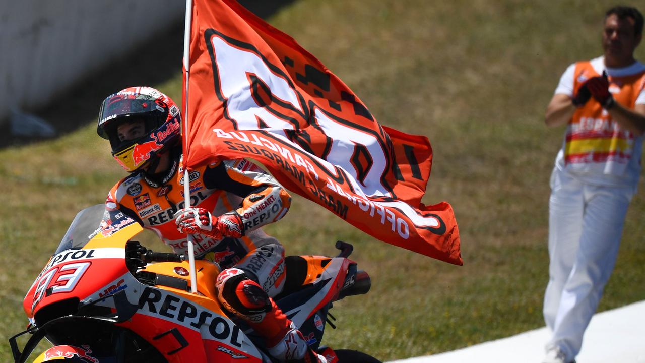 Repsol Honda Team's Spanish rider Marc Marquez celebrates his victory. 