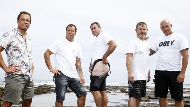 Bite Club members at Shelly Beach Ballina. (From left) supporter Dan Webber, shark victims David Pearson and Dale Carr, supporters Kevin Young and Darren Rogers. Picture: Jerad Williams