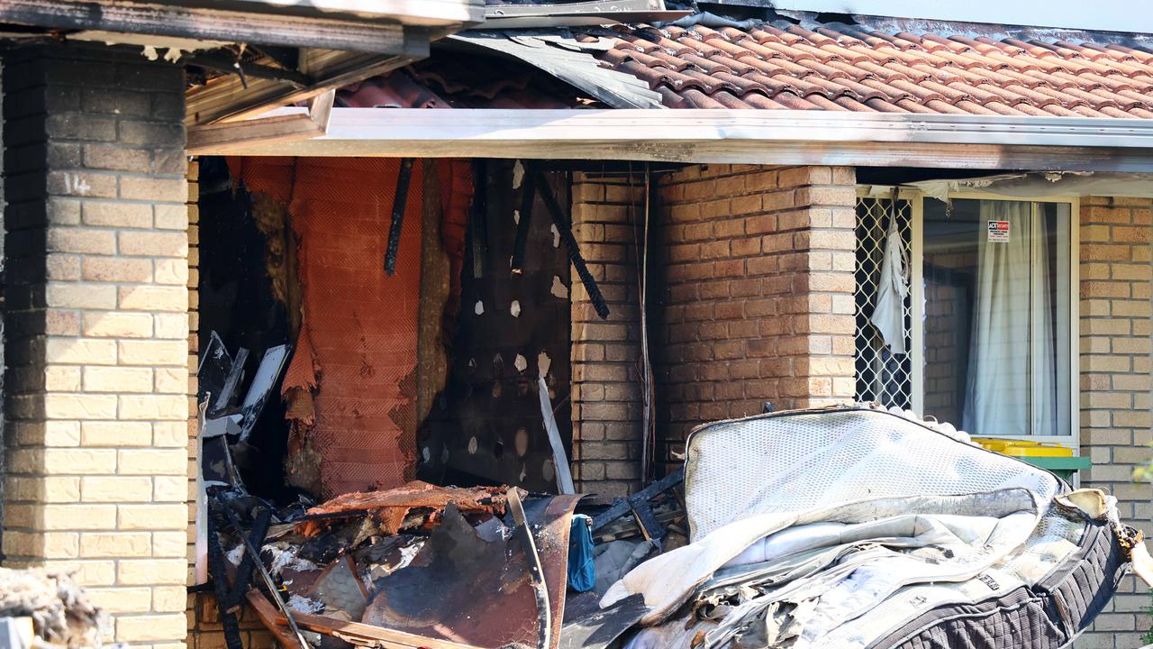 Neighbours told how they attempted to rip off the garage door to gain access to the property before being beaten back by the flames. Picture: NewsWire/Tertius Pickard