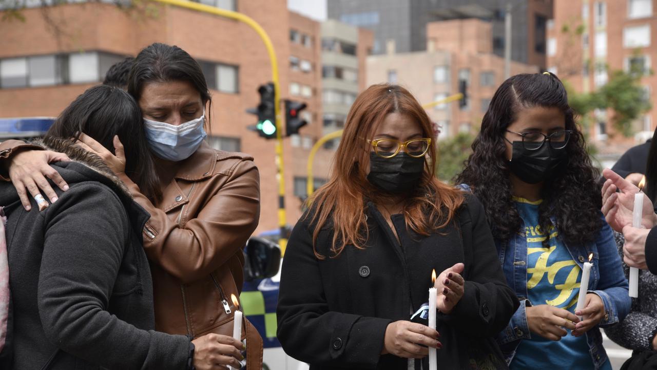 Fans of the Foo Fighters hold candles outside Casa Medina Hotel where the band's drummer Taylor Hawkins was found dead. Picture: Guillermo Legaria/Getty Images