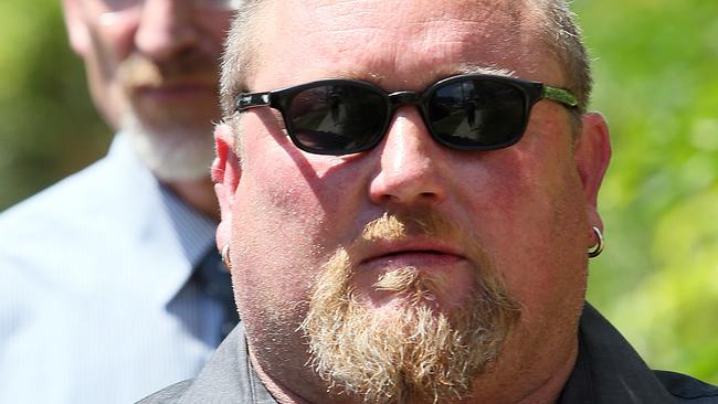 Bandidos National President Jason Addison outside Maroochydore Magistrates Court. Behind him is his Ballart Solicitor Mike Wardell. Pic Glenn Barnes