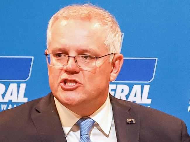 SYDNEY, AUSTRALIA - MAY 14: Prime Minister Scott Morrison speaks during the Federal Budget Lunch at the Hyatt Regency Sydney on May 14, 2021 in Sydney, Australia. The Morrison government's third budget was delivered on Tuesday, with a focus on funding for women's health, aged care and infrastructure.  (Photo by David Gray/Getty Images)