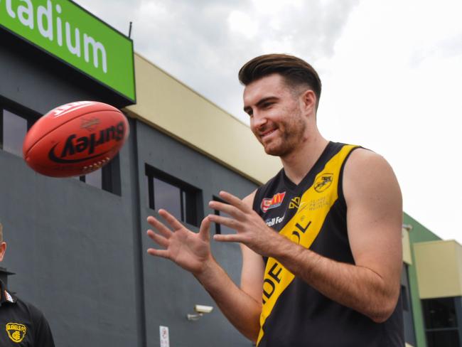 ACH Group is the new naming rights sponsor of the Glenelg Football Club, Thursday, November 1, 2018. Trudy Sutton acting CEO ECH Group, Glenelg Football Club president Nick Chigwidden, coach Mark Stone and player Liam McBean. (AAP Image/ Brenton Edwards)