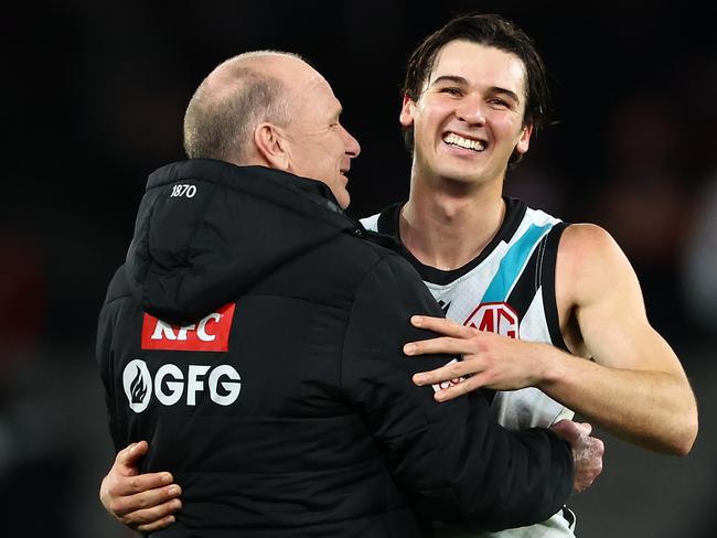 MELBOURNE, AUSTRALIA - JUNE 30: Ken Hinkley, Senior Coach of the Power and Connor Rozee of the Power celebrate winning the round 16 AFL match between St Kilda Saints and Port Adelaide Power at Marvel Stadium, on June 30, 2024, in Melbourne, Australia. (Photo by Quinn Rooney/Getty Images)