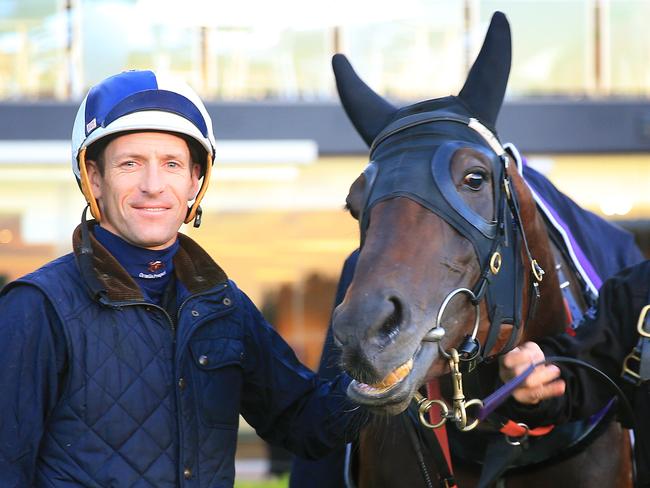 Hugh Bowman and Winx smile for the camera after trackwork at Rosehill Gardens ahead of the Championships Day 2 on the weekend. Pic: Mark Evans