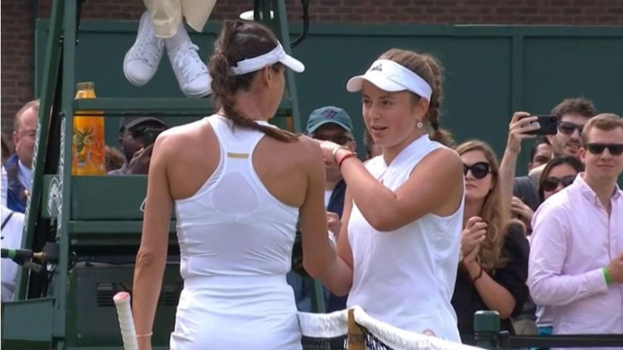 Jelena Ostapenko (R) and Tomljanovic clash at Wimbledon in 2021.
