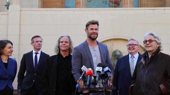 Hemsworth, Miller, with producer Doug Mitchell at Fox Studios alongside NSW premier Gladys Berejiklian, treasurer Dominic Perrottet, federal communications minister Paul Fletcher and NSW arts minister Arts Don Harwin; to announce the film would be shot in NSW. Picture: Dylan Coker