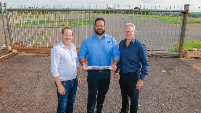 AFLNT chairman Sean Bowden, right, with Larrakia Development Corporation CEO Nigel Browne and AFLNT CEO Stuart Totham at the proposed stadium site on McMinn St. Picture GLENN CAMPBELL