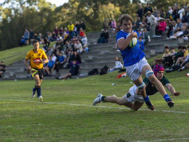 Seb Kracht on the move for St Edmund's. Ironically the lock is pictured on a sideline run to the tryline - ironic because he played wing last season.