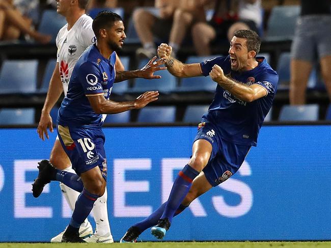 NEWCASTLE, AUSTRALIA - FEBRUARY 07: Ronald Vargas of Newcastle Jets  celebrates with team mate Jason Hoffman during the round 18 A-League match between the Newcastle Jets and the Wellington Phoenix at McDonald Jones Stadium on February 07, 2019 in Newcastle, Australia. (Photo by Tony Feder/Getty Images)