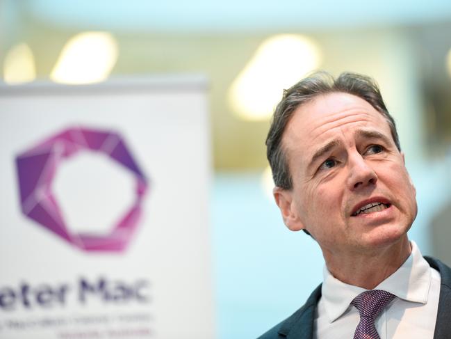 The Federal Minister for Health Greg Hunt speaks to the media during a press conference at the Peter Mac Centre in Melbourne, Sunday, July 15, 2018. The Minister is announcing an overhaul of the private health insurance system to introduce tiers for treatments. (AAP Image/Penny Stephens) NO ARCHIVING