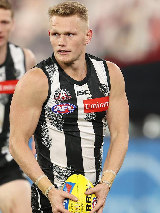 Treloar in action for Collingwood in the AFL.