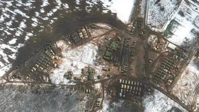 This Maxar satellite image released on February 22 shows a new deployment of material support and troops in Krasnyy Oktyabr, a rural area southwest of Belgorod, Russia, less than 20kms to the northwest of the border with Ukraine.