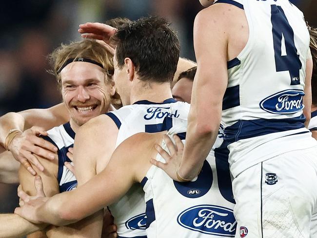 MELBOURNE, AUSTRALIA - JUNE 03: Tom Stewart of the Cats celebrates a goal with teammates during the 2023 AFL Round 12 match between the Western Bulldogs and the Geelong Cats at Marvel Stadium on June 3, 2023 in Melbourne, Australia. (Photo by Michael Willson/AFL Photos via Getty Images)