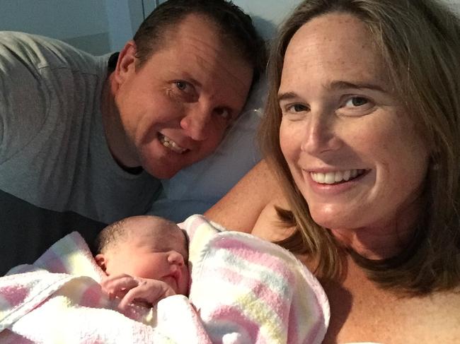 Sam George and Kate Penfold with their newborn Hannah, who needed an in uterine blood transfusion.