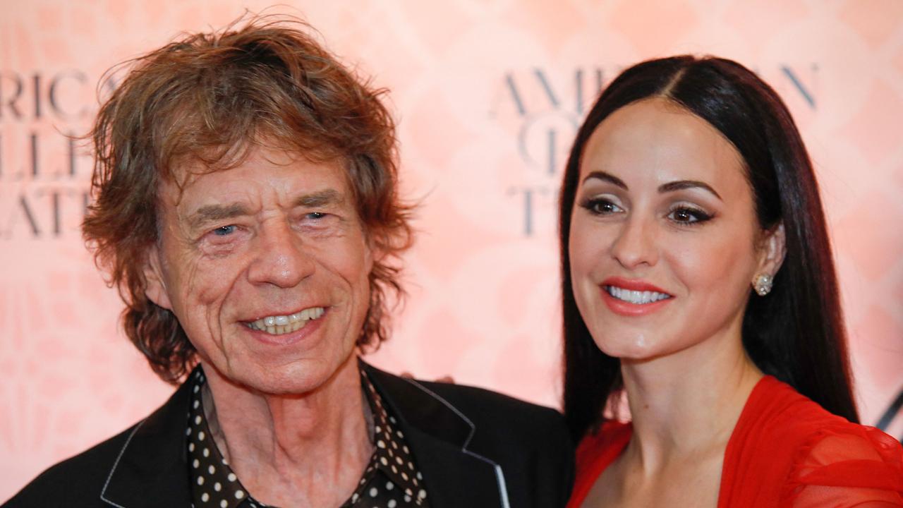 English singer Mick Jagger and his wife US choreographer Melanie Hamrick. (Photo by KENA BETANCUR / AFP)